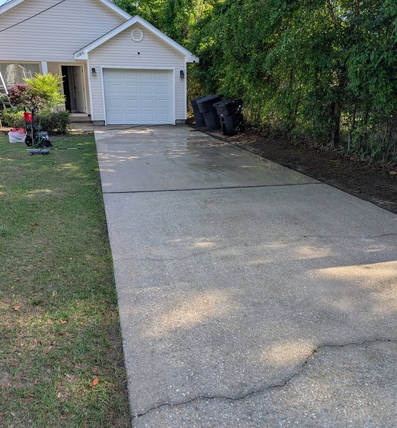 freshly cleaned driveway after pressure washing