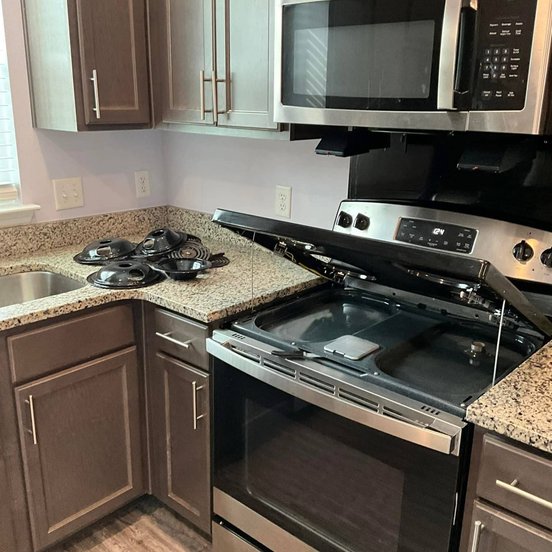 kitchen stove deep cleaning in a rental property